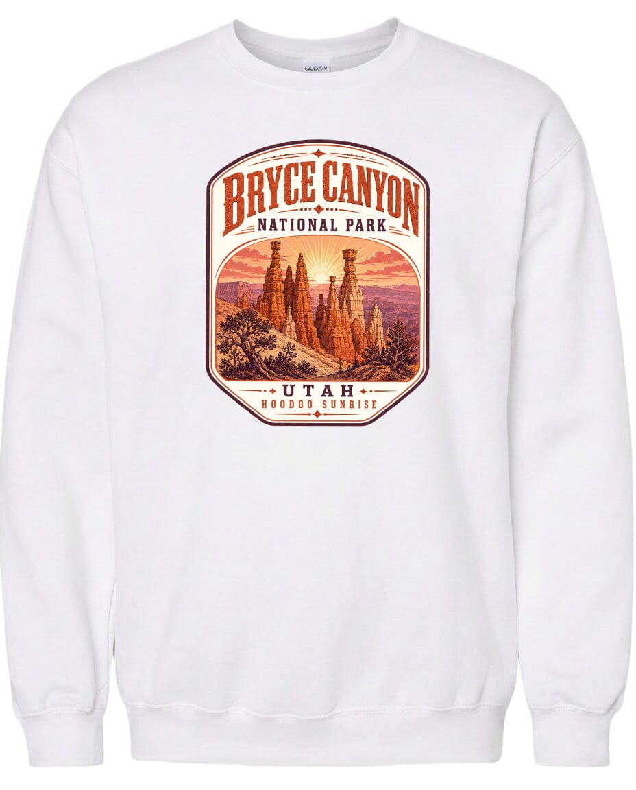 A white sweatshirt with a graphic design depicting the Bryce Canyon National Park in Utah.