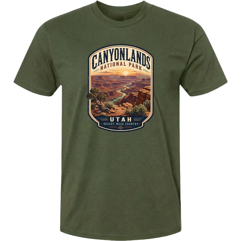 A t-shirt design featuring a scenic landscape with mountains, valleys, and a sunset. The text on the t-shirt reads "CANYONLANDS NATIONAL PARK" and "UTAH", indicating the location and the name of the national park.
