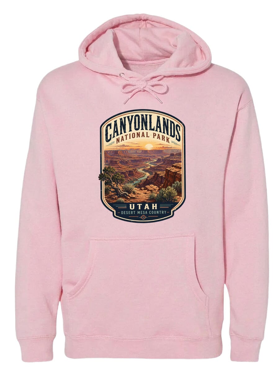 A pink hoodie with a graphic design depicting the scenic landscape of Canyonlands National Park in Utah.