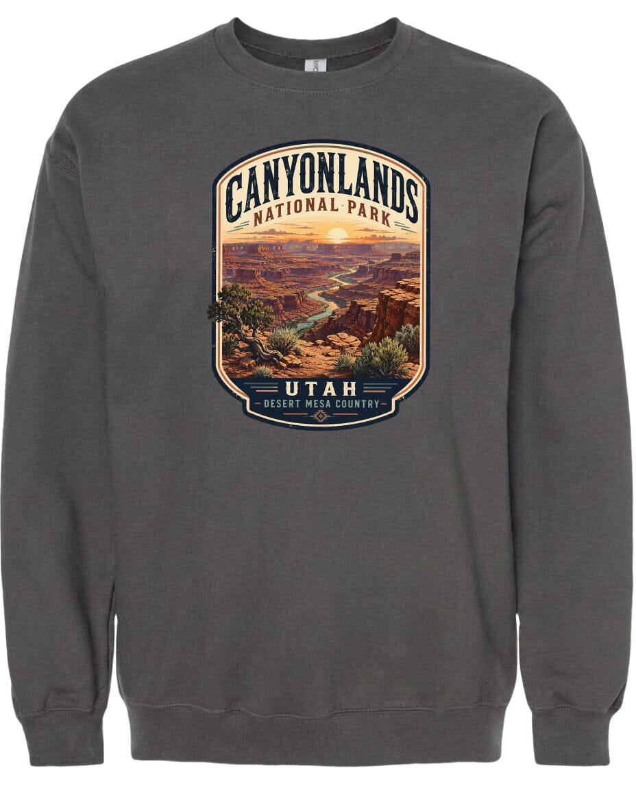A gray sweatshirt with a graphic design depicting the scenic landscape of Canyonlands National Park in Utah.