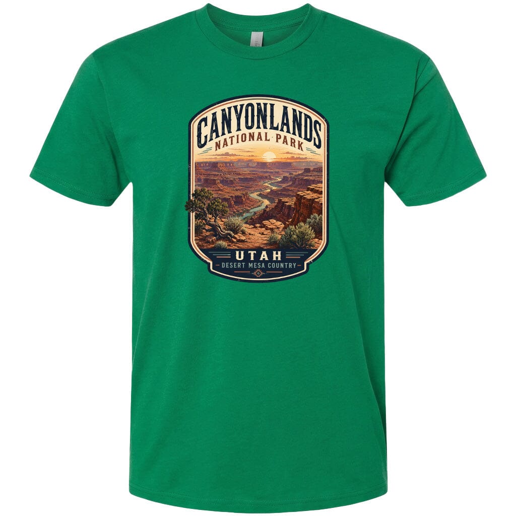 A green t-shirt with a graphic design depicting a scenic landscape of the Canyonlands National Park in Utah.