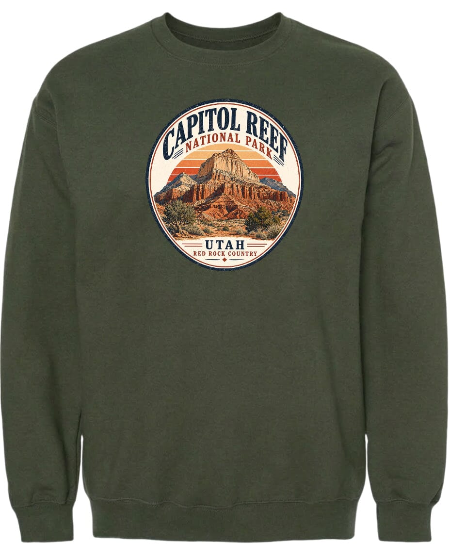 A green sweatshirt with a circular design featuring the Capitol Reef National Park in Utah.