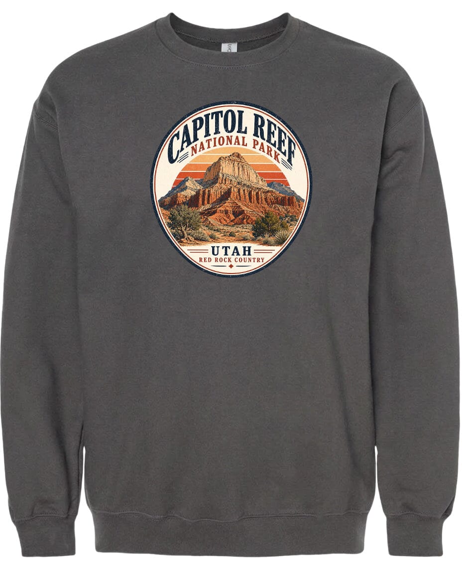 A gray sweatshirt with a circular graphic design featuring the Capitol Reef National Park in Utah.