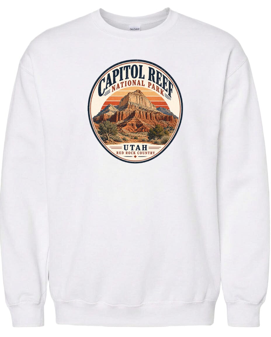 A white sweatshirt with a circular design featuring the Capitol Reef National Park in Utah.