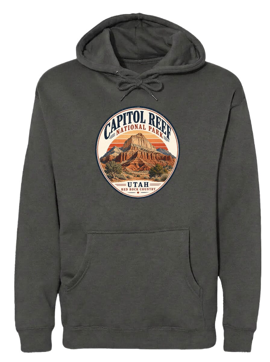 A gray hoodie with a circular design featuring the Capitol Reef National Park logo and a mountain landscape.