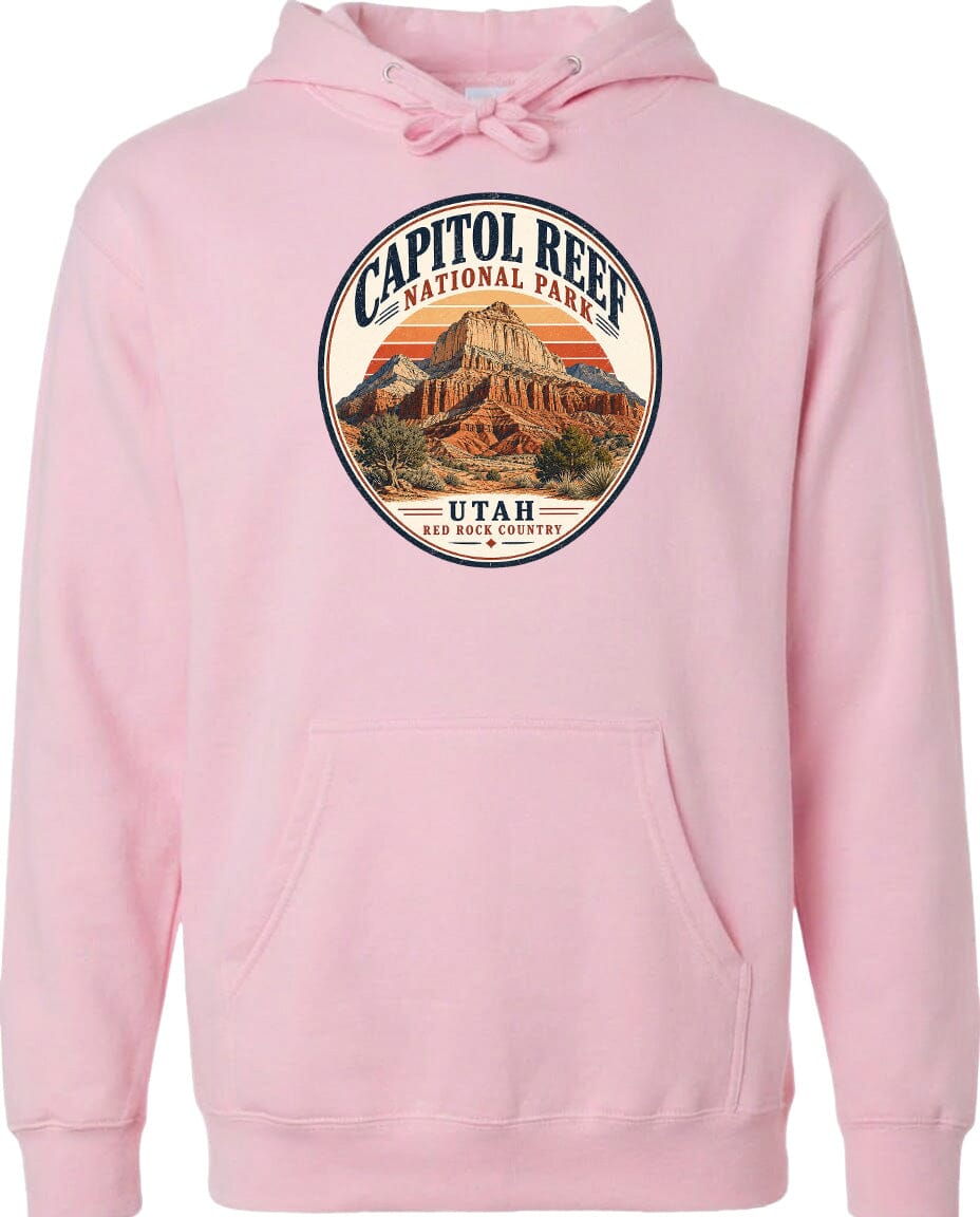 A pink hoodie with a circular design featuring the Capitol Reef National Park in Utah.