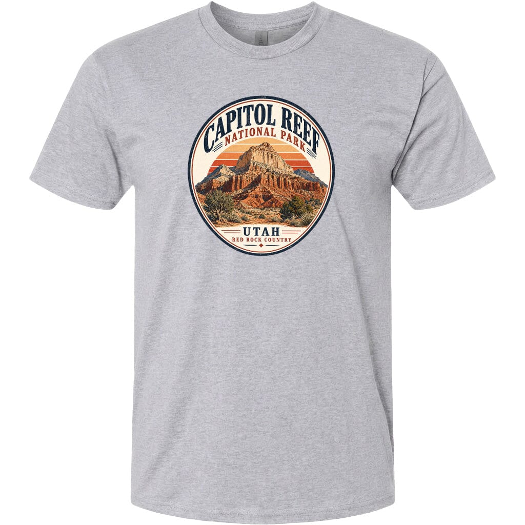 A gray t-shirt with a circular design featuring the Capitol Reef National Park in Utah.