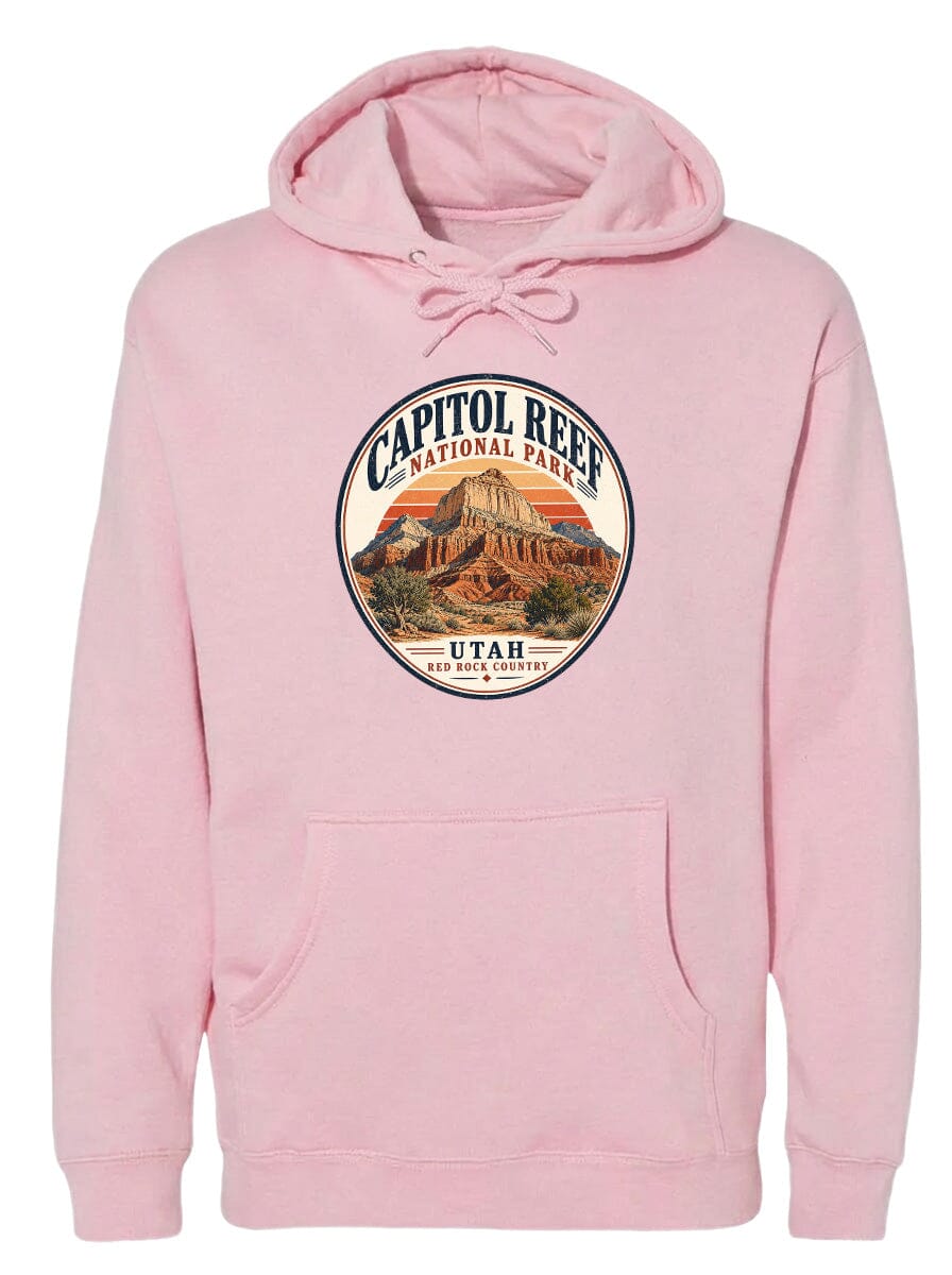 A pink hoodie with a circular design featuring the Capitol Reef National Park and Utah.