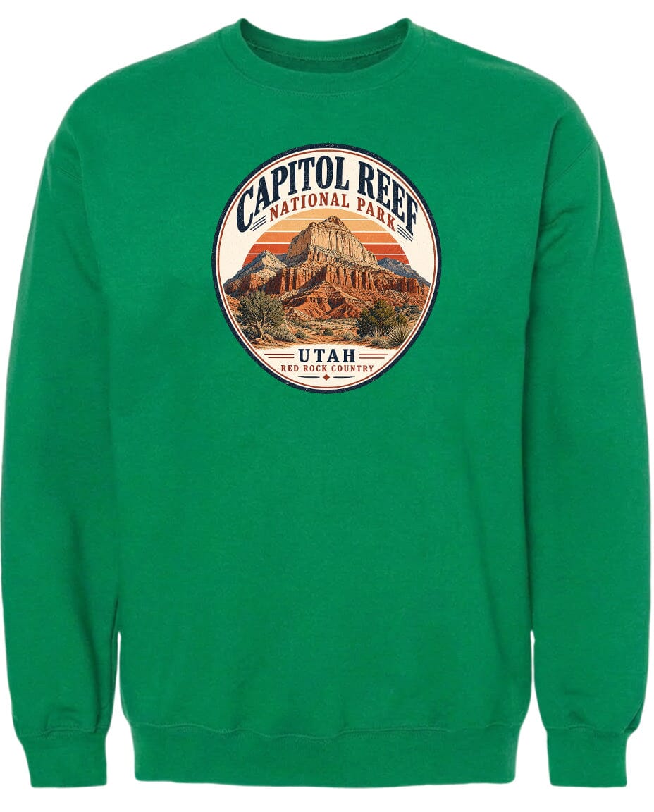 A green sweatshirt with a circular design featuring the Capitol Reef National Park in Utah.