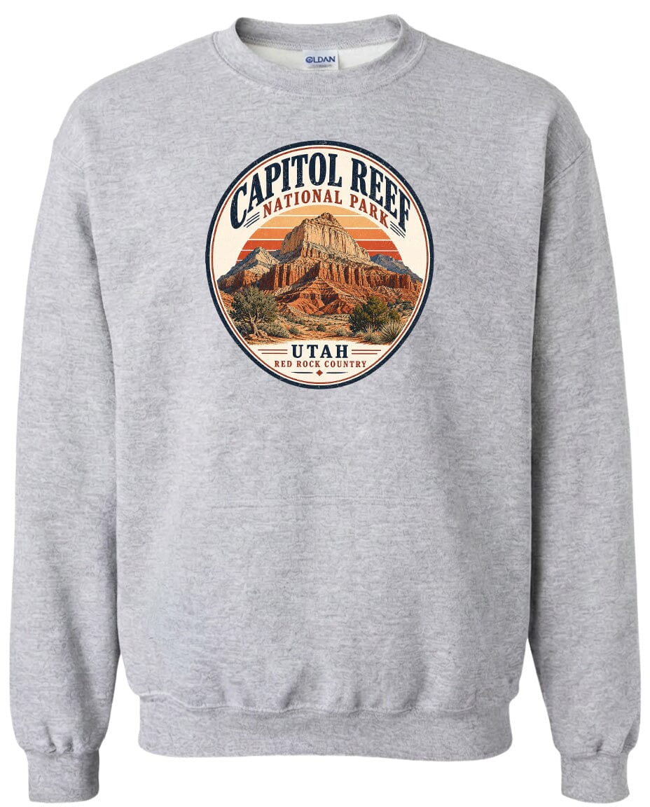 A gray sweatshirt with a circular graphic design featuring the Capitol Reef National Park in Utah.