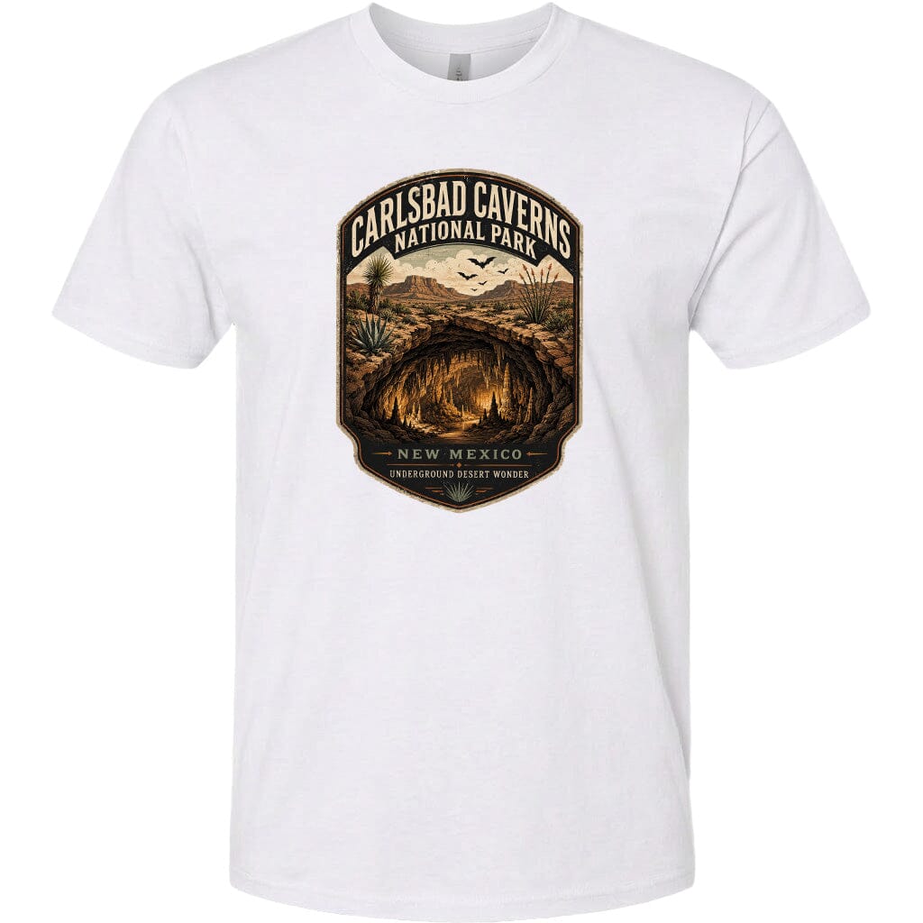 A white t-shirt with a graphic design depicting the Carlsbad Caves National Park in New Mexico.