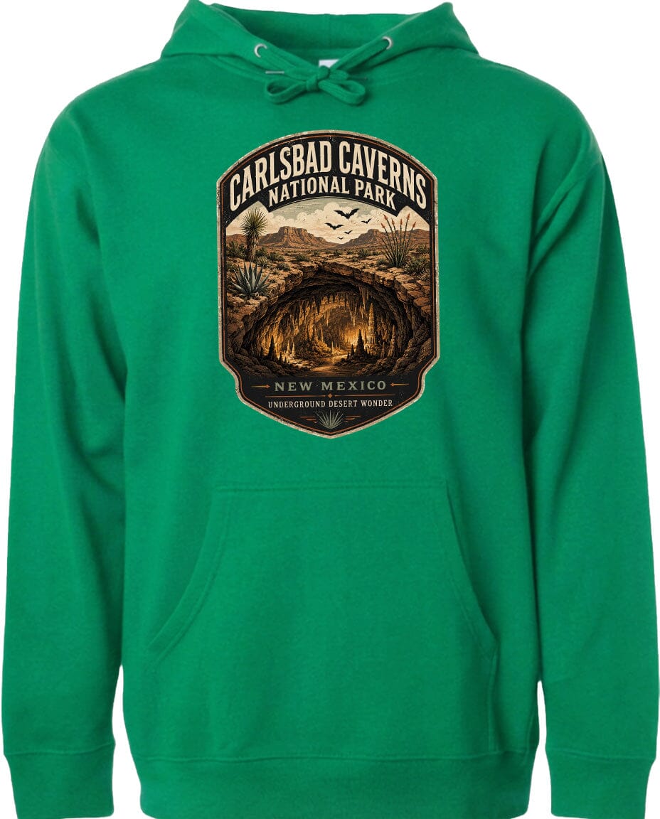 A green hoodie with a graphic design depicting the Carlsbad Caverns National Park in New Mexico.