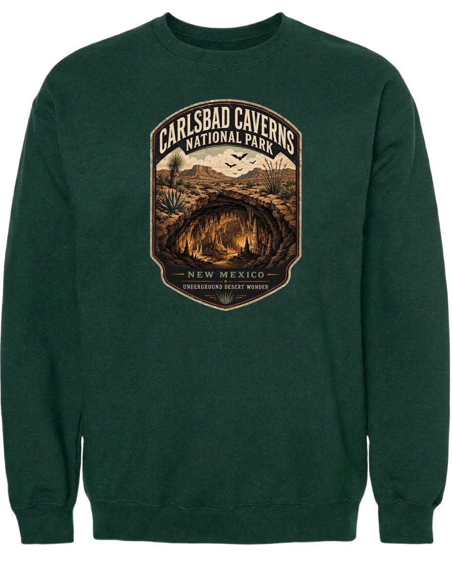 A green sweatshirt with a graphic design depicting the Carlsbad Caves National Park in New Mexico.