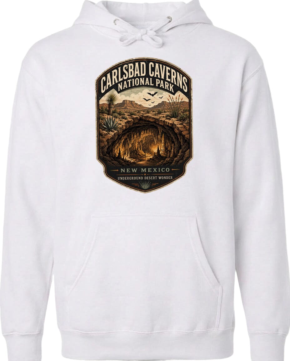 A white hoodie with a graphic design depicting the Carlsbad Caverns National Park in New Mexico.