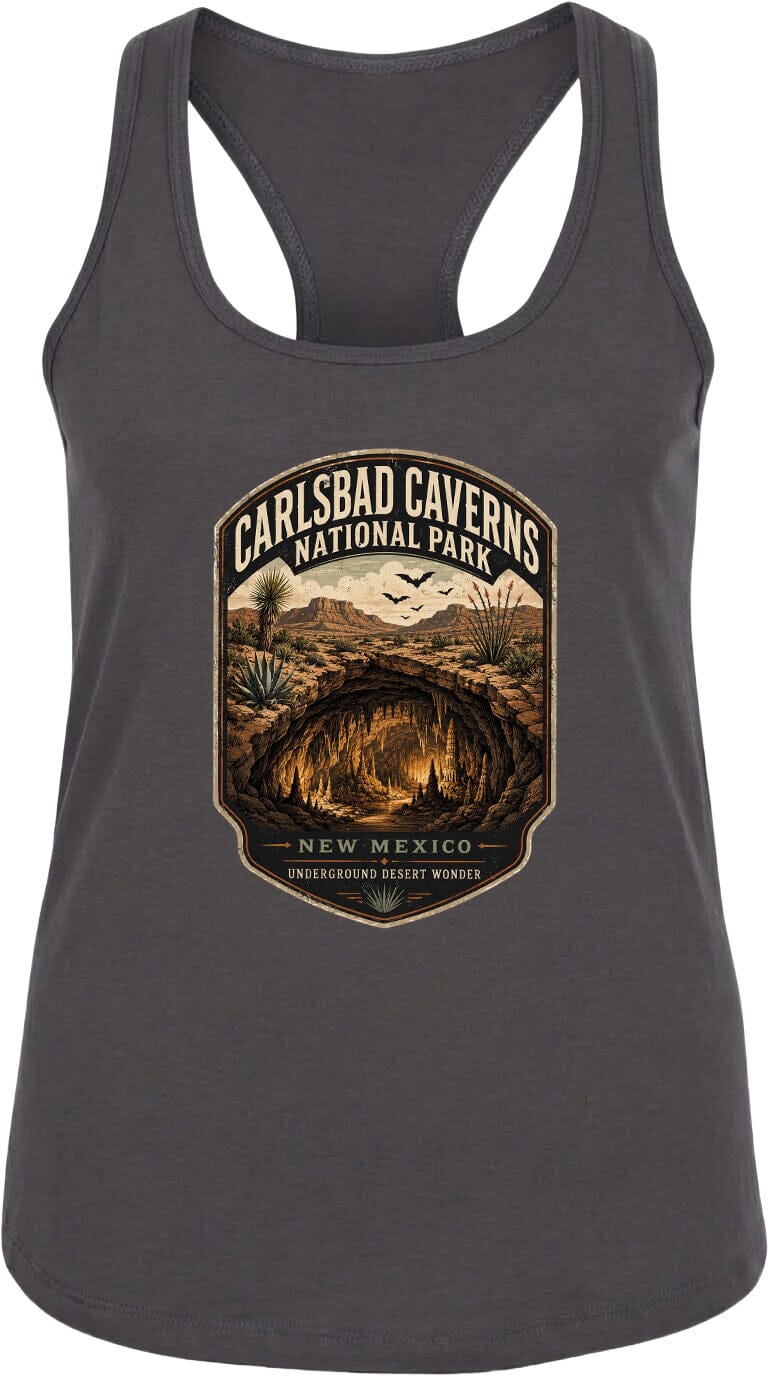 A gray tank top with a graphic design depicting the Carlsbad Caves National Park in New Mexico, featuring a desert landscape with a cave system and birds in the sky.
