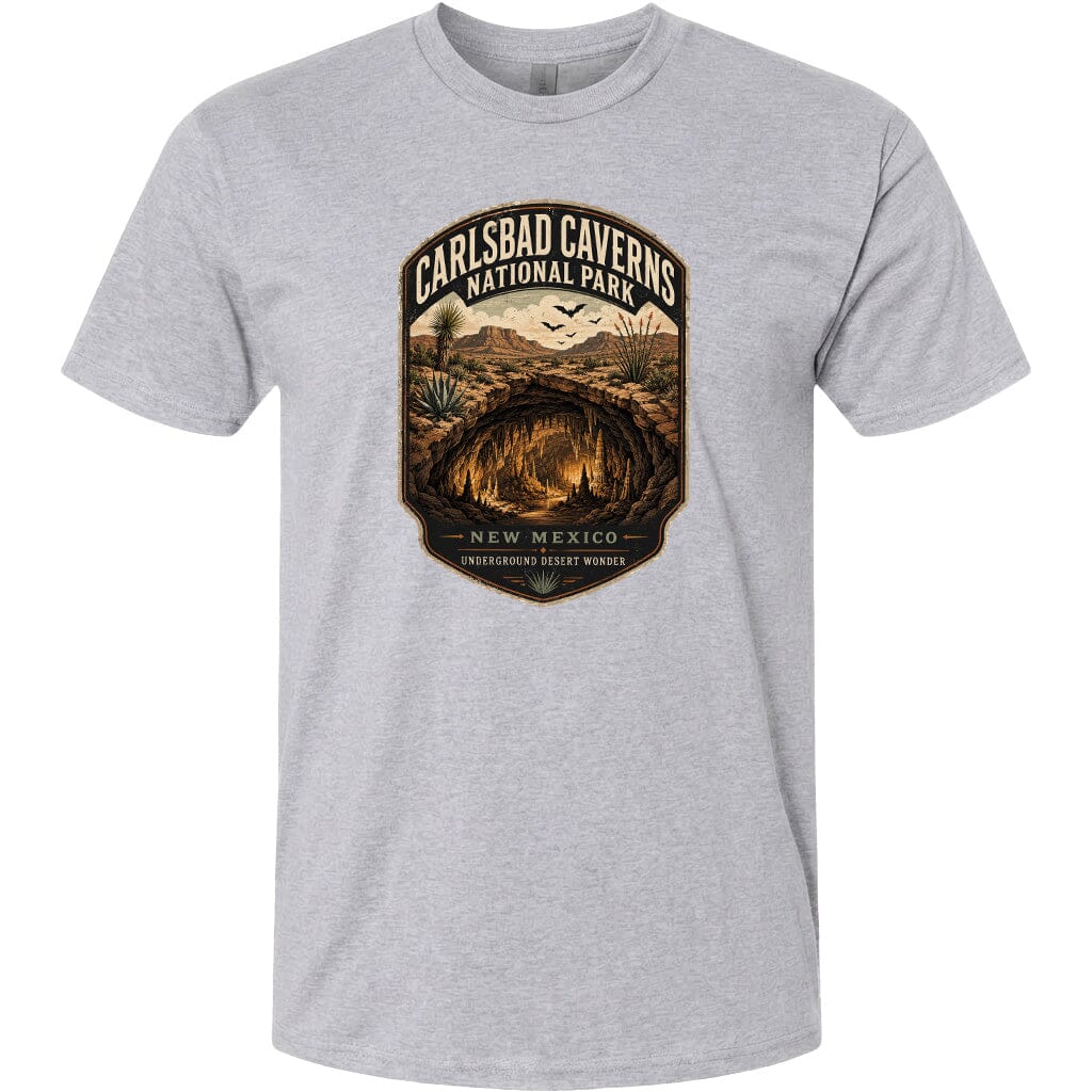 A gray t-shirt with a graphic design depicting the Carlsbad Caverns National Park in New Mexico.
