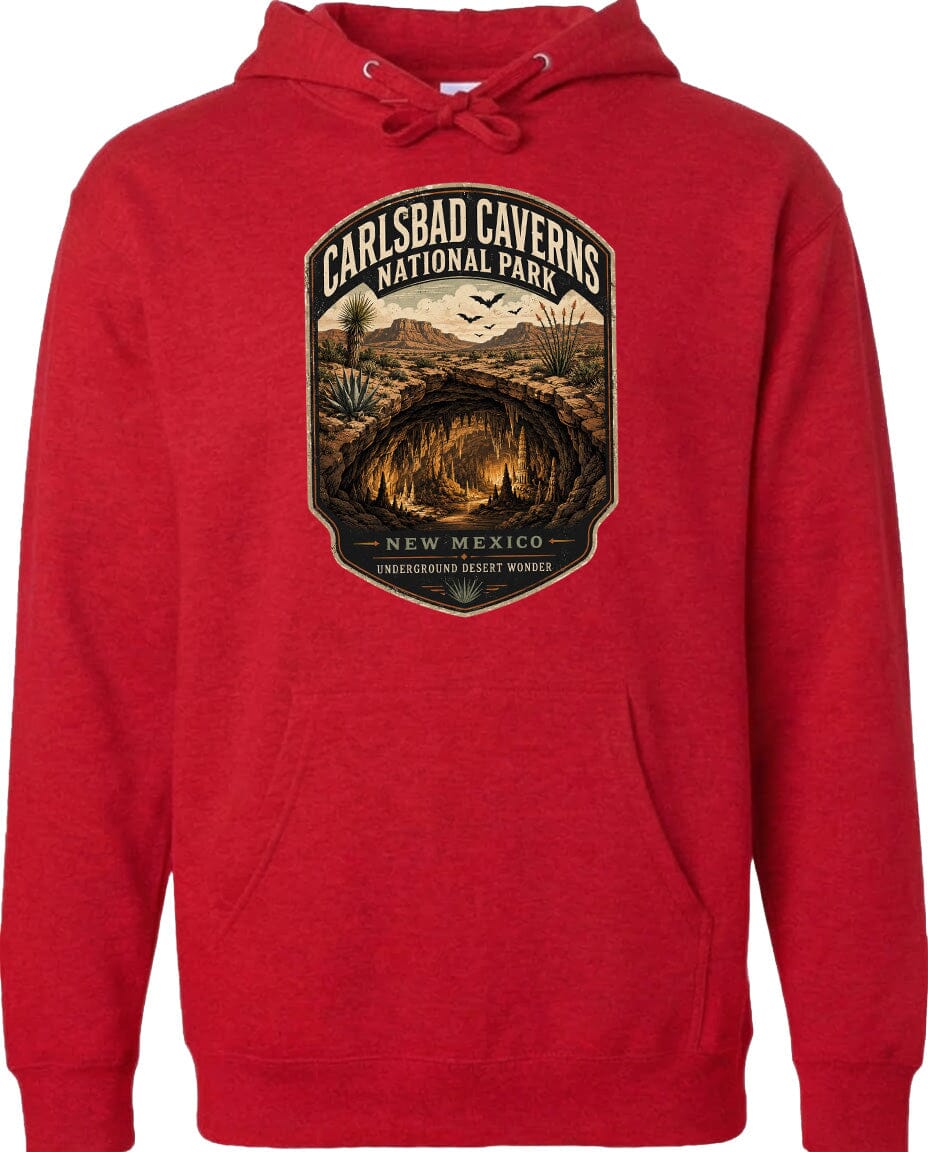 A red hoodie with a graphic design depicting a desert landscape with a cave or tunnel in the center, surrounded by mountains and other natural features.