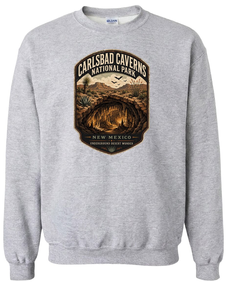 A gray sweatshirt with a graphic design depicting the Carlsbad Caverns National Park in New Mexico.