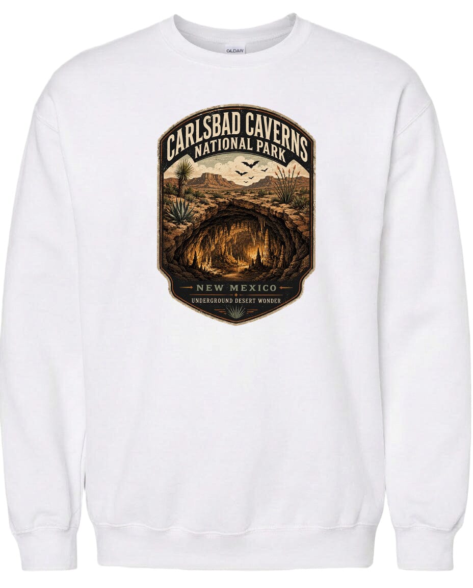A white sweatshirt with a graphic design depicting the Carlsbad Caverns National Park in New Mexico.
