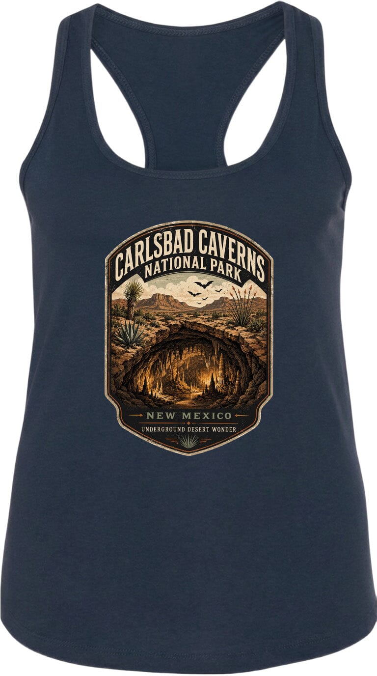 A graphic design on a dark blue tank top featuring a desert landscape with a cave, mountains, and birds in the sky.