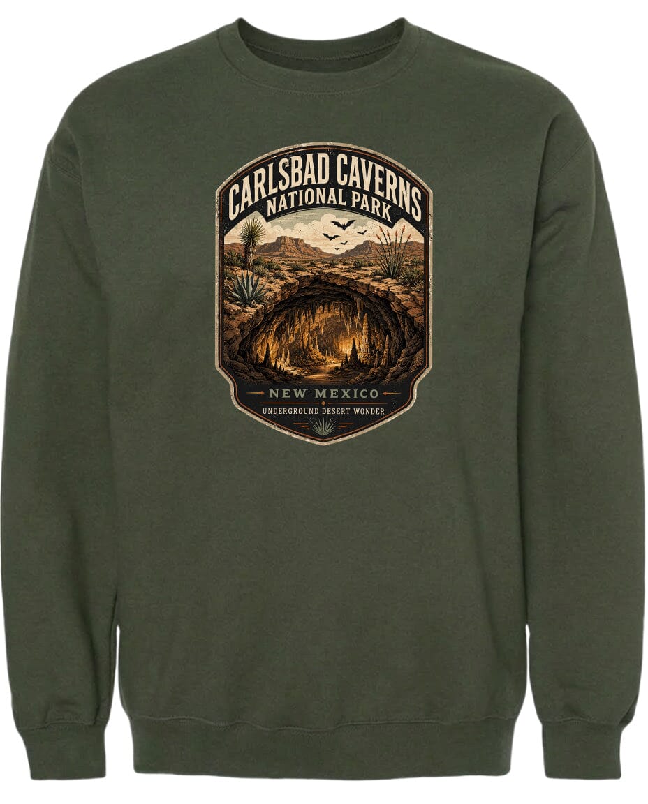 A green sweatshirt with a graphic design depicting the Carlsbad Caves National Park in New Mexico.