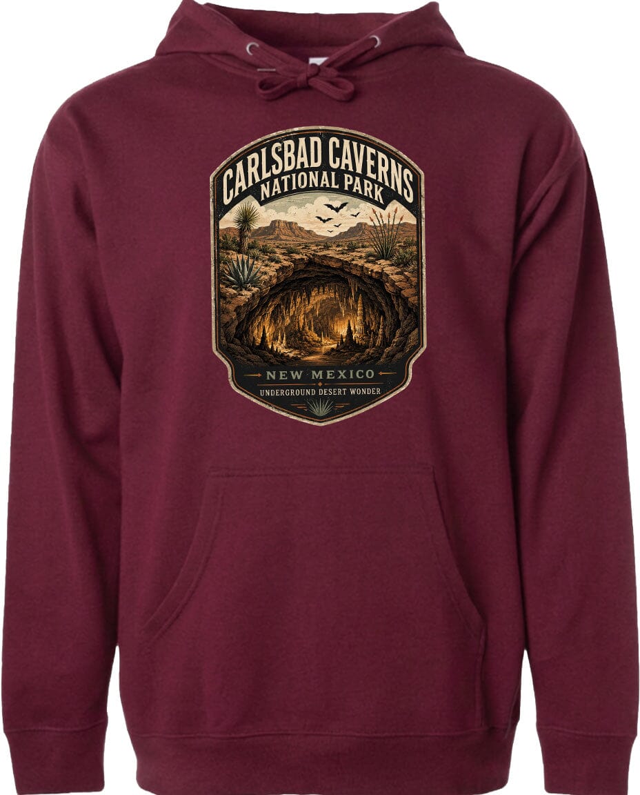 A burgundy hoodie with a graphic design depicting the Carlsbad Caverns National Park in New Mexico.