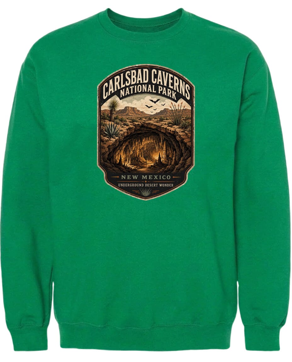 A green sweatshirt with a graphic design depicting the Carlsbad Caverns National Park in New Mexico.
