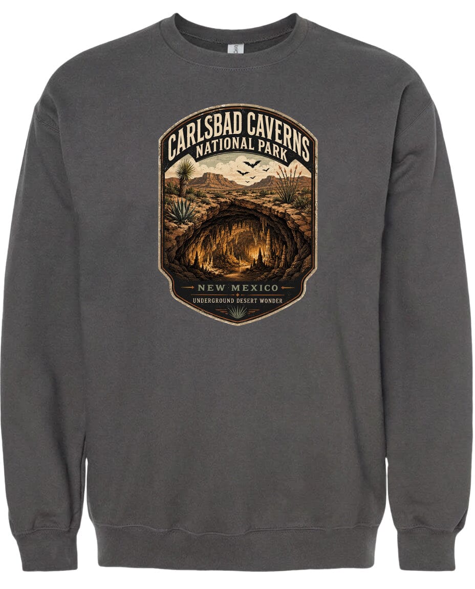 A gray sweatshirt with a graphic design depicting the Carlsbad Caverns National Park in New Mexico.