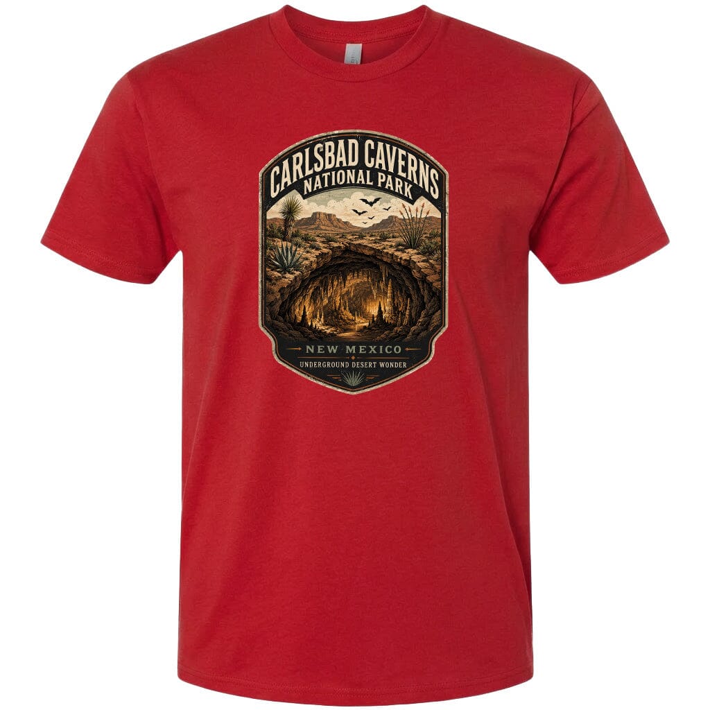 A red t-shirt with a graphic design depicting the Carlsbad Caves National Park in New Mexico.