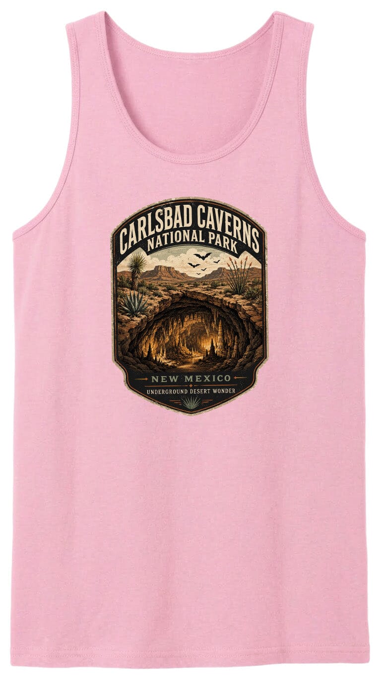 A pink tank top with a graphic design depicting the Carlsbad Caves National Park in New Mexico, featuring a desert landscape with a cave system and birds in flight.