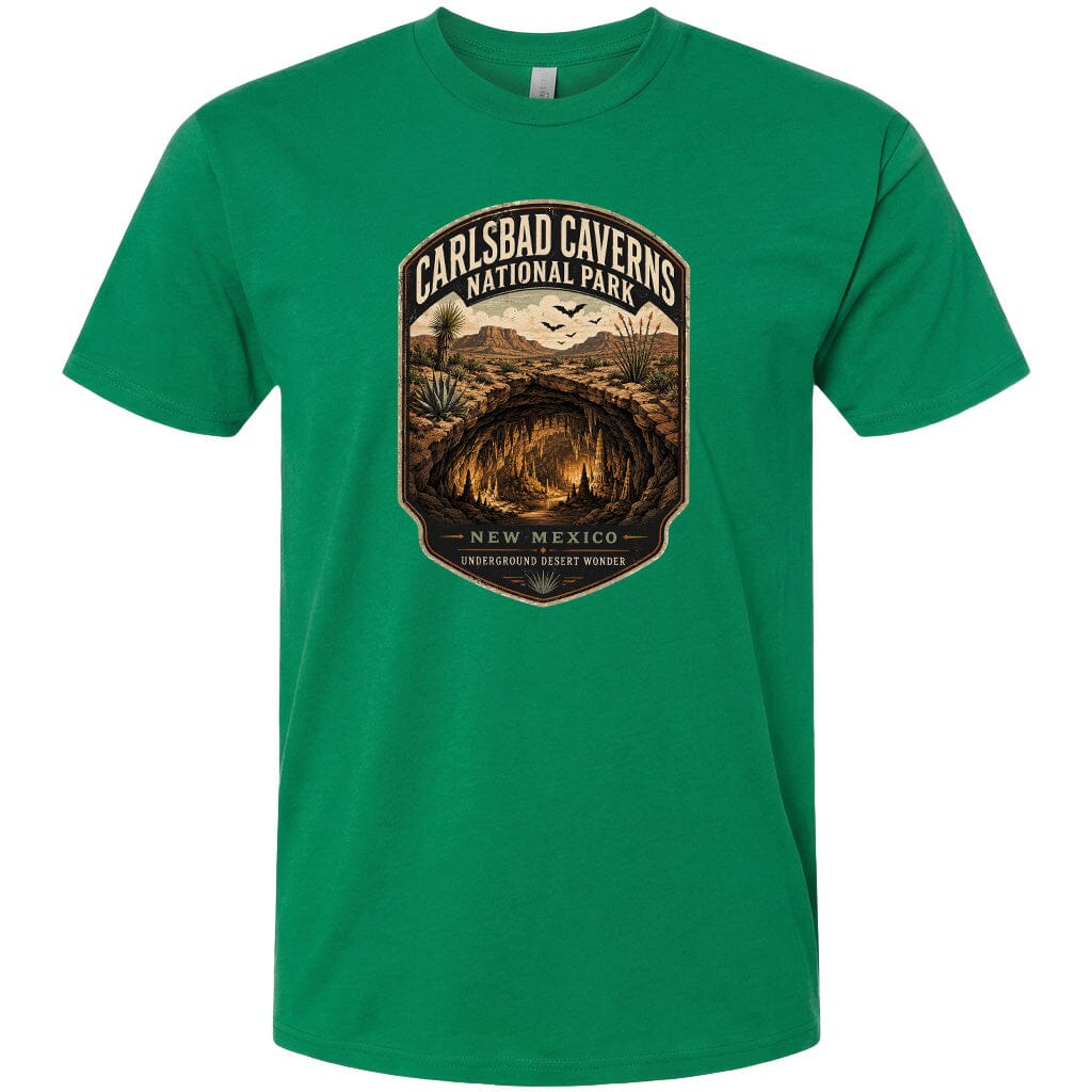 A green t-shirt with a graphic design depicting the entrance to Carlsbad Caverns National Park in New Mexico.