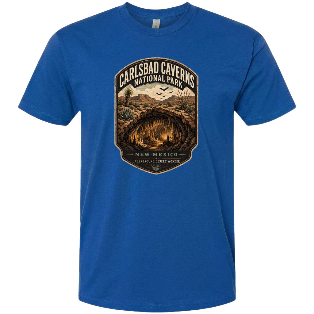 A blue t-shirt with a graphic design depicting the Carlsbad Caves National Park in New Mexico.