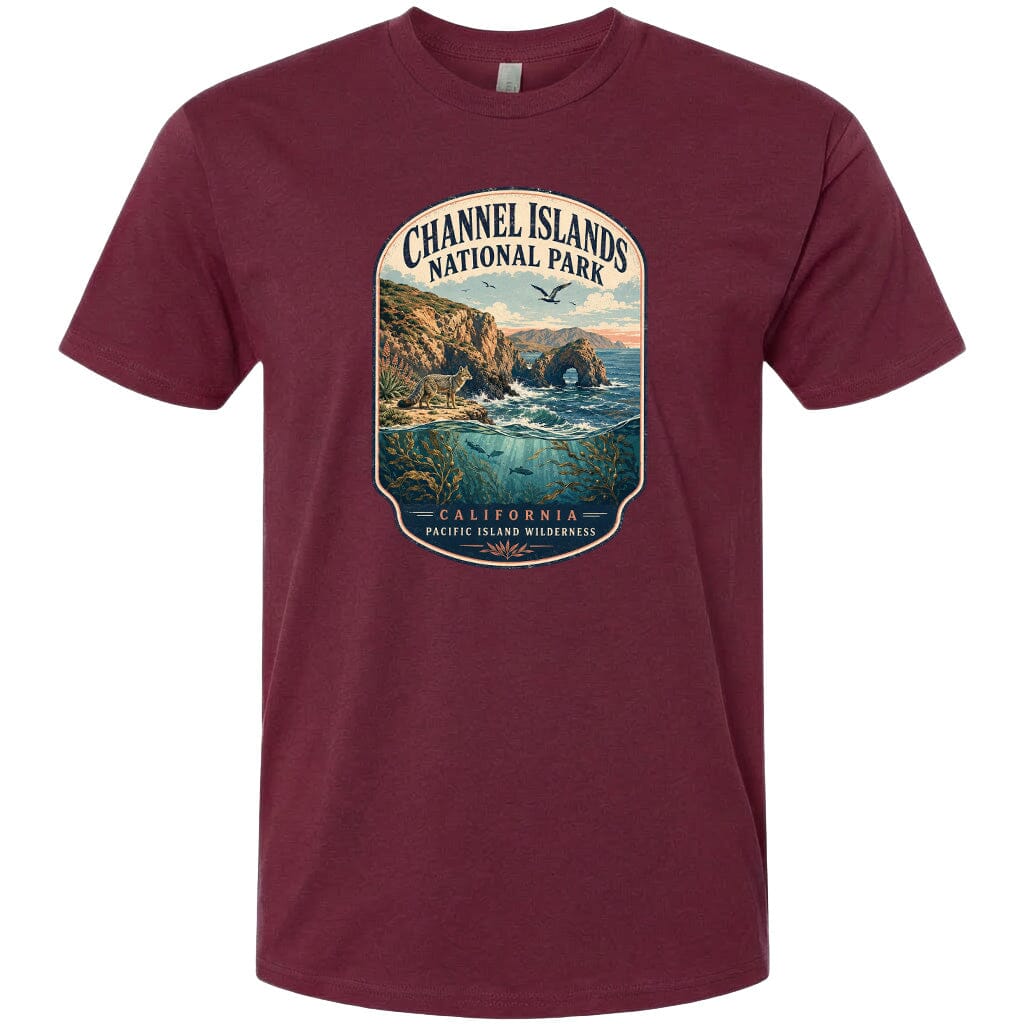A t-shirt design featuring a scenic landscape with a coastal area, mountains, and a body of water.
