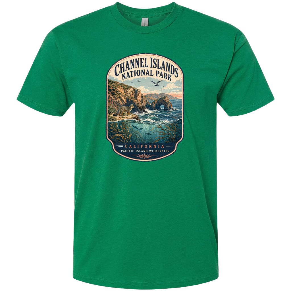 A green t-shirt with a graphic design depicting a scenic coastal landscape with cliffs, water, and wildlife.