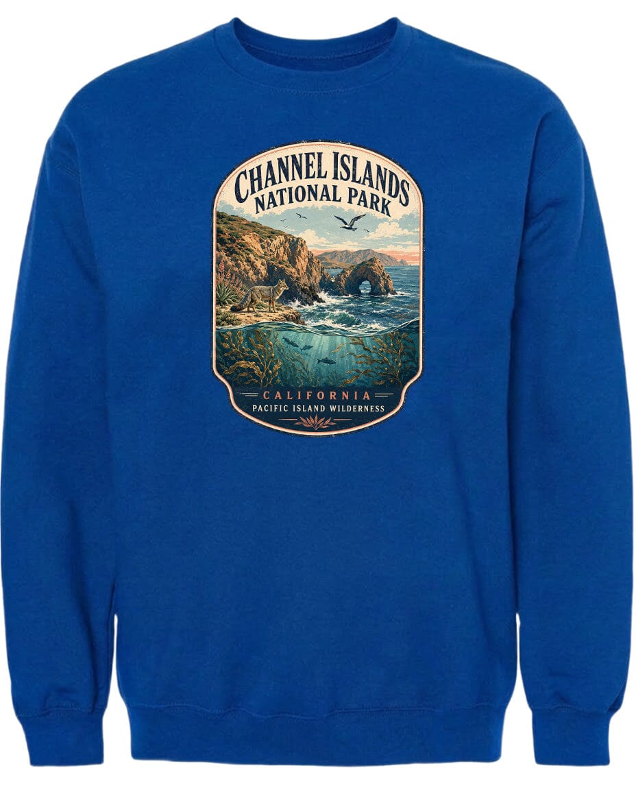 A blue sweatshirt with a graphic design depicting a scenic landscape with cliffs, water, and birds.