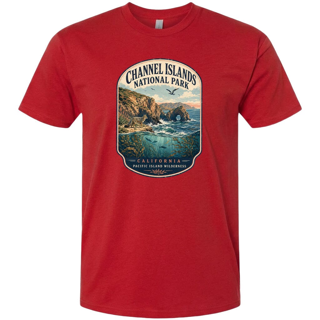 A red t-shirt with a graphic design depicting a scenic coastal landscape with cliffs, water, and wildlife.