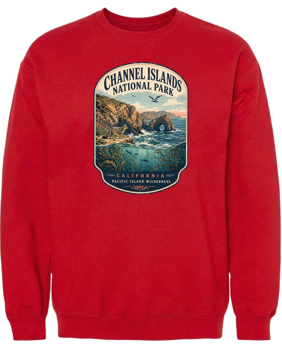 A red sweatshirt with a graphic design depicting a scenic landscape with cliffs, water, and birds.