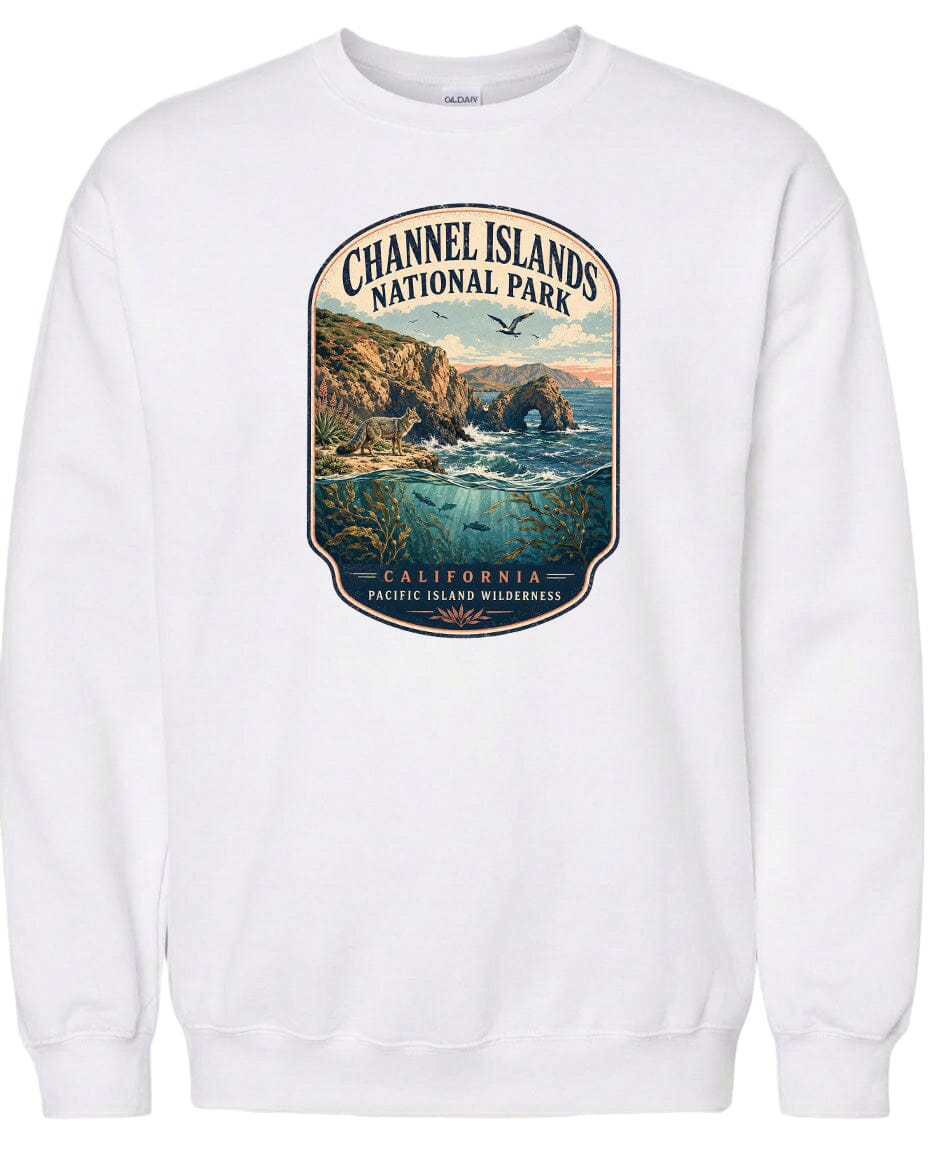 A white sweatshirt with a graphic design depicting a scenic landscape with cliffs, water, and birds.