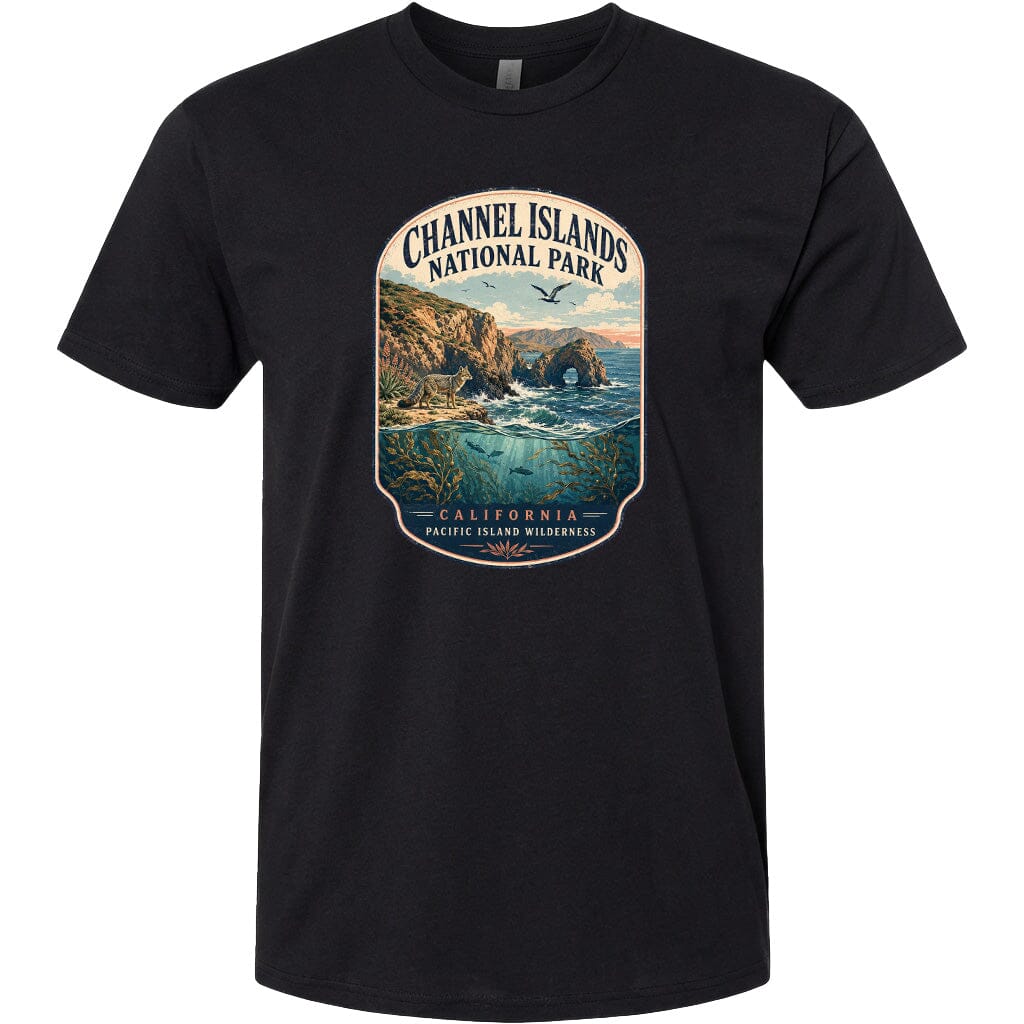 A black t-shirt with a graphic design depicting a scenic coastal landscape with cliffs, water, and wildlife.