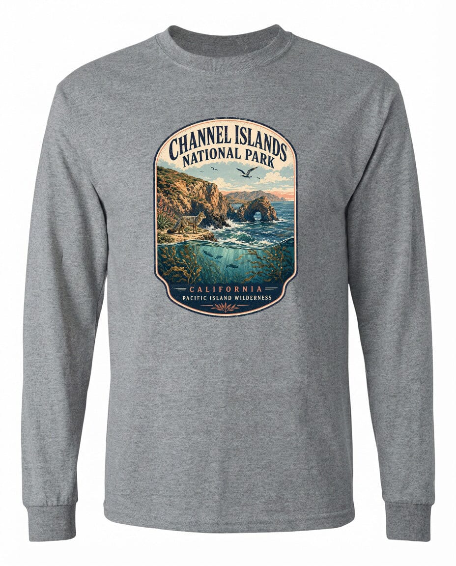 A gray long-sleeved t-shirt with a graphic design depicting a scenic coastal landscape with cliffs, water, and a bird in flight.