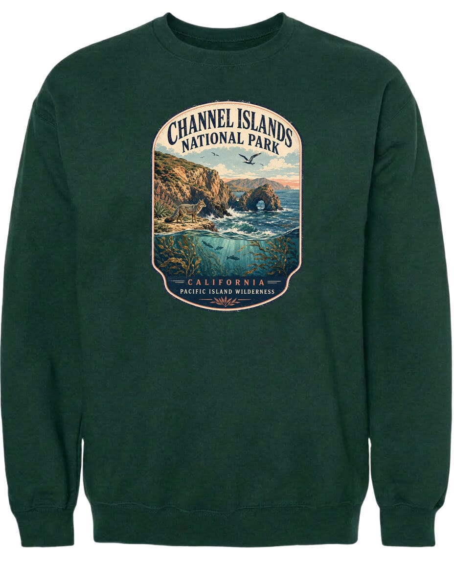 A green sweatshirt with a graphic design depicting a scenic landscape with cliffs, water, and a bird in flight.
