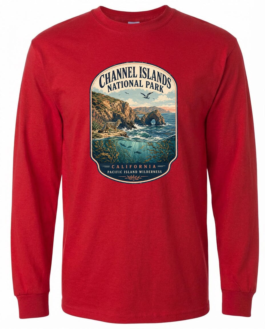 A red long-sleeved t-shirt with a graphic design depicting a scenic landscape featuring a coastal area with cliffs, water, and a bird in flight.