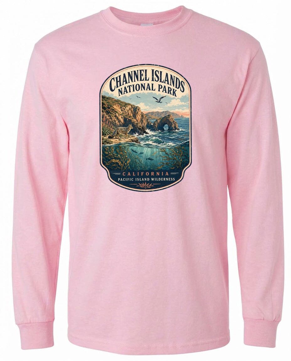 A pink long-sleeved t-shirt with a graphic design depicting a scenic landscape featuring a rocky coastline, a waterfall, and a bird in flight.