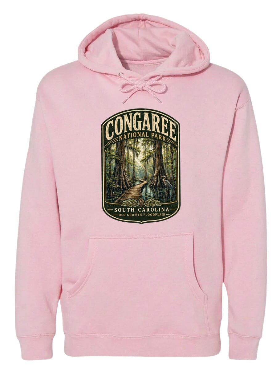 A pink hoodie with a graphic design depicting a forest scene, specifically the Congaree National Park in South Carolina.