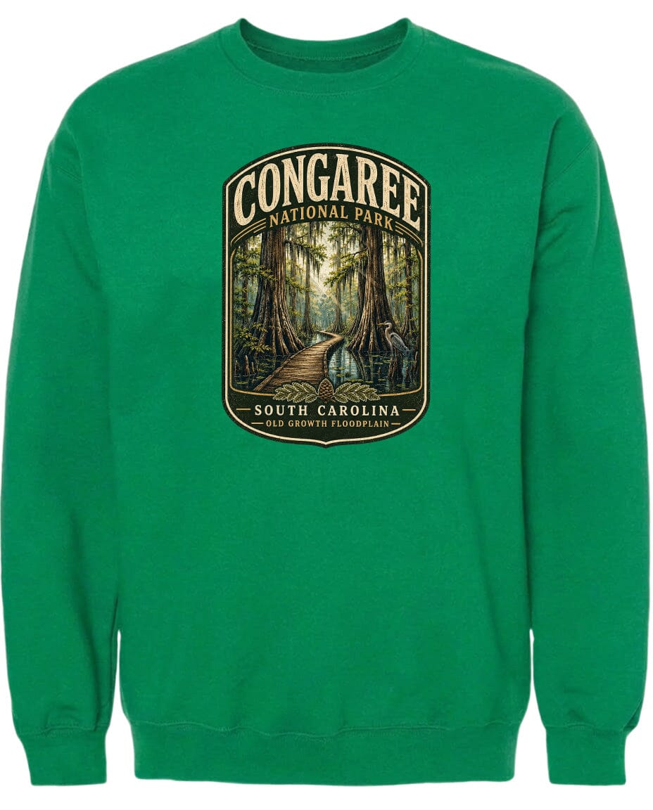 A green sweatshirt with a graphic design depicting a forest scene with a path leading through it.