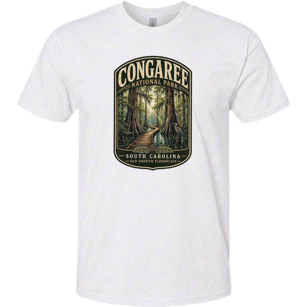 A white t-shirt with a graphic design depicting a forest scene with a path leading through it, surrounded by trees and foliage.