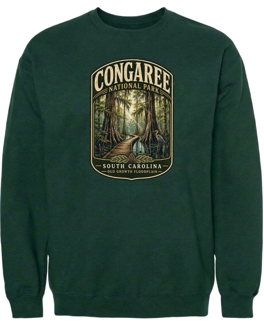 A green sweatshirt with a graphic design depicting a forest scene with a path leading through it.