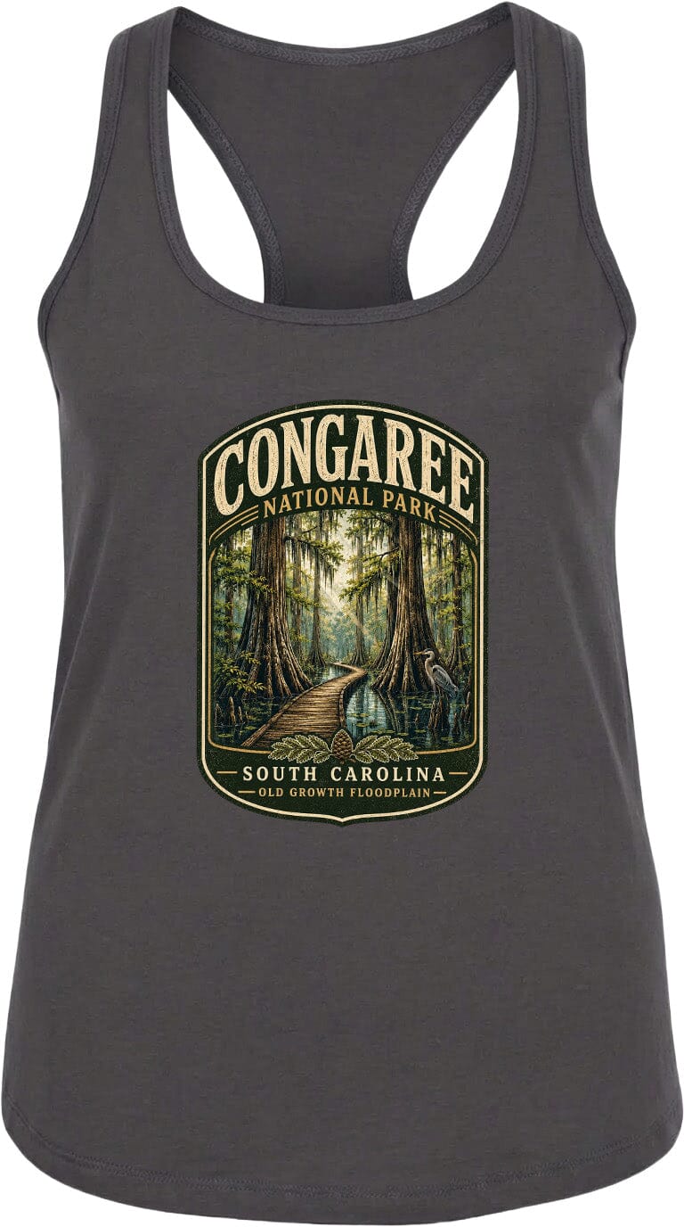 A gray tank top with a graphic design depicting a forest scene, featuring a path leading through the trees and the text "CONGAREE NATIONAL PARK SOUTH CAROLINA OLD GROWTH FLOODPLAIN".