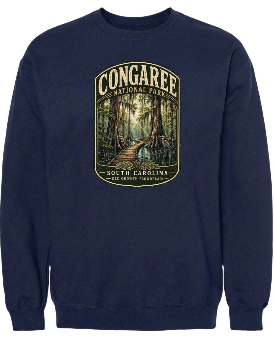 A navy blue sweatshirt with a graphic design depicting a forest scene with a path leading through it.