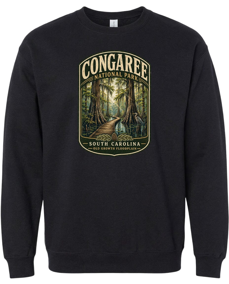 A black sweatshirt with a graphic design depicting a forest scene with a path leading through it.
